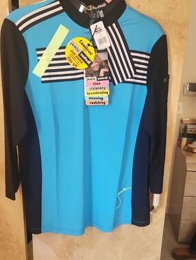 jamie sadock Bright Turquoise with Black Striped Accent Golf Top